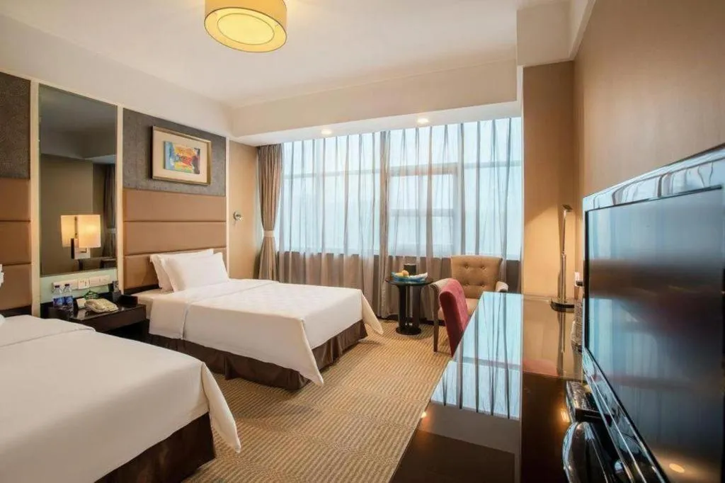 Bed in Zibo Blue Horizon International Hotel