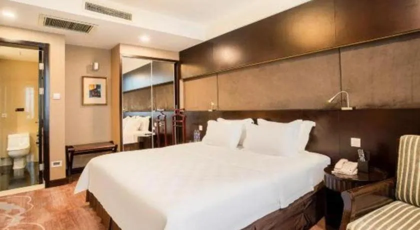 Bed in Zibo Blue Horizon International Hotel