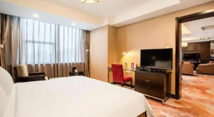 Bed in Zibo Blue Horizon International Hotel