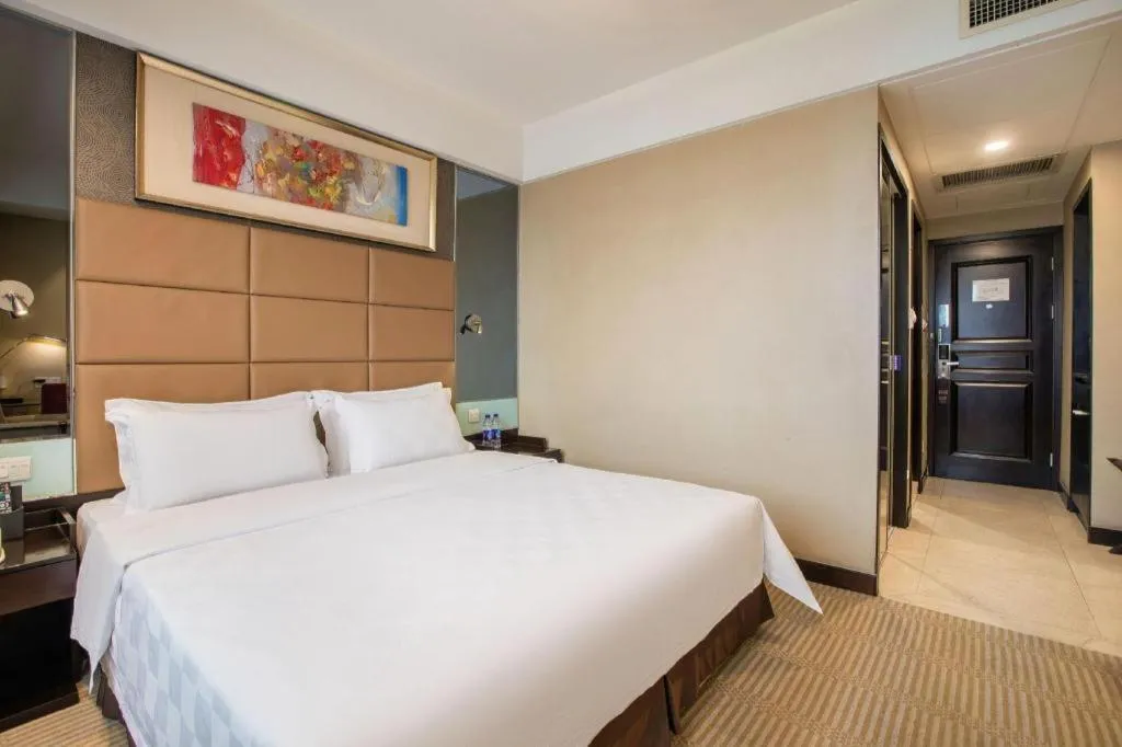 Bed in Zibo Blue Horizon International Hotel