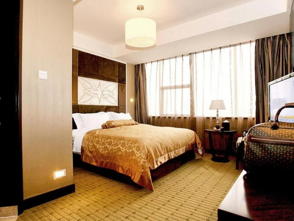 Bed in Zibo Blue Horizon International Hotel