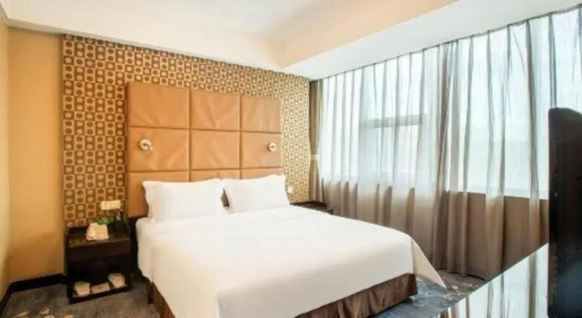 Bed in Zibo Blue Horizon International Hotel