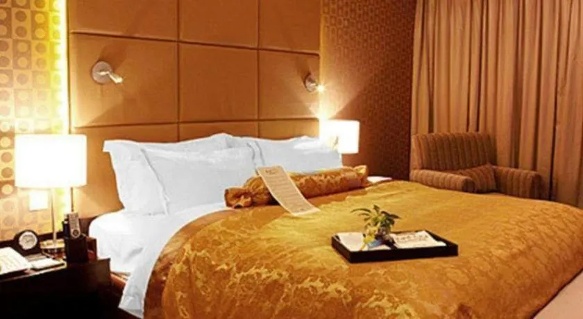 Bed in Zibo Blue Horizon International Hotel