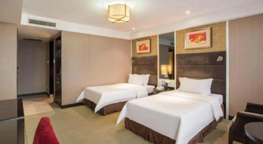 Bed in Zibo Blue Horizon International Hotel