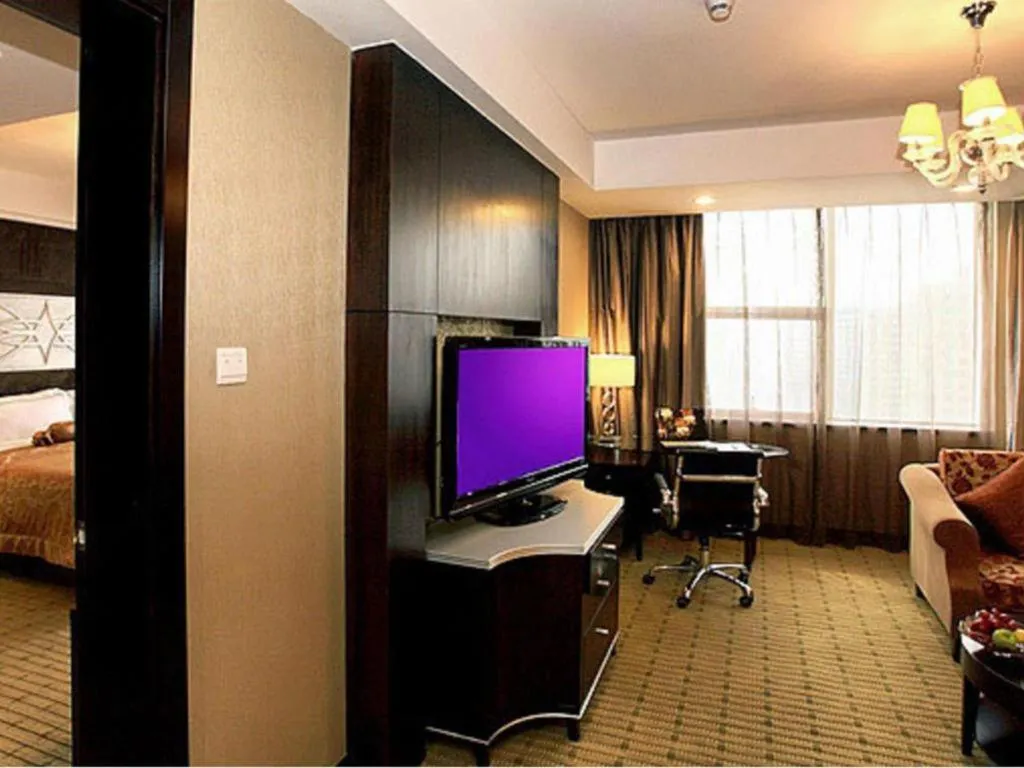 Bed in Zibo Blue Horizon International Hotel