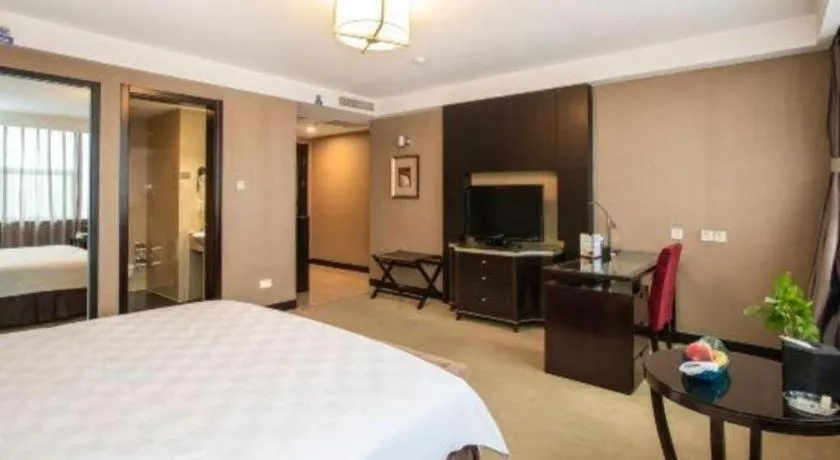 Bed in Zibo Blue Horizon International Hotel