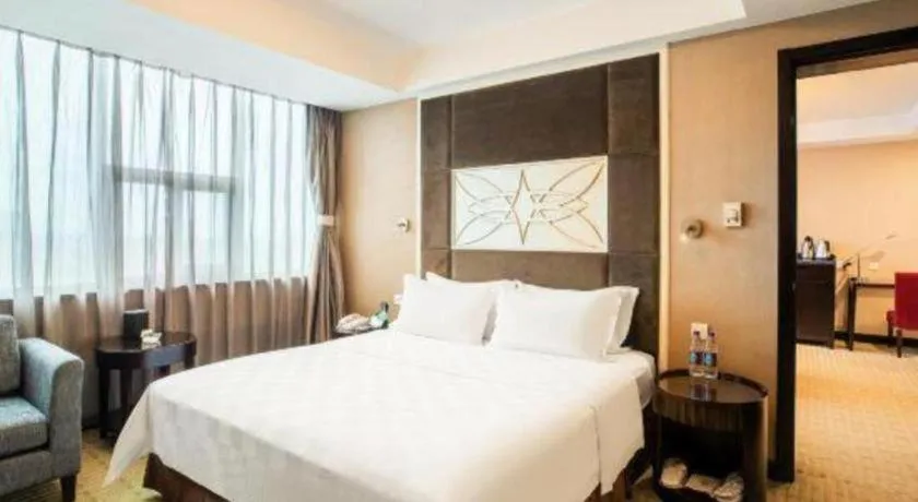 Bed in Zibo Blue Horizon International Hotel