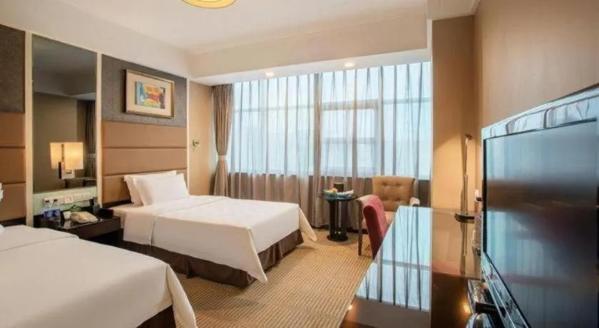 Bed in Zibo Blue Horizon International Hotel