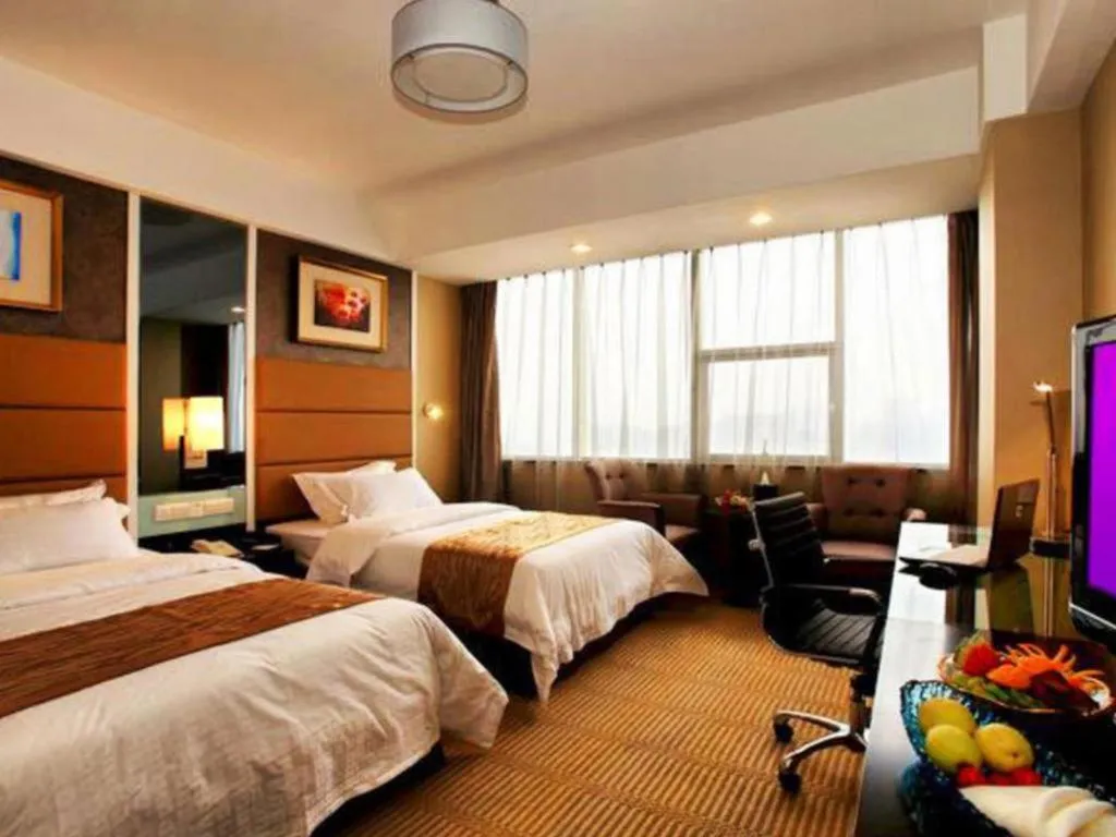 Bed in Zibo Blue Horizon International Hotel