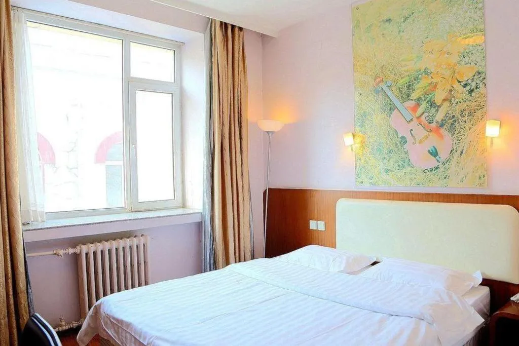 Bed in Super 8 Hotel Beijing International Exhibition Center