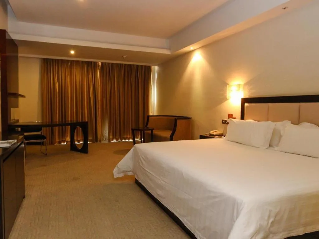Bed in Shenggao Hotel Guangzhou Dongpu Branch