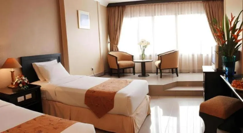 Bed in Danau Toba Hotel International