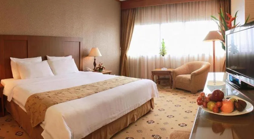 Bed in Danau Toba Hotel International