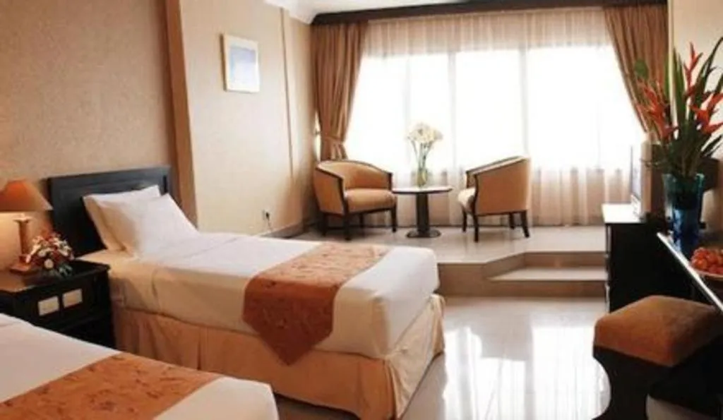 Bed in Danau Toba Hotel International