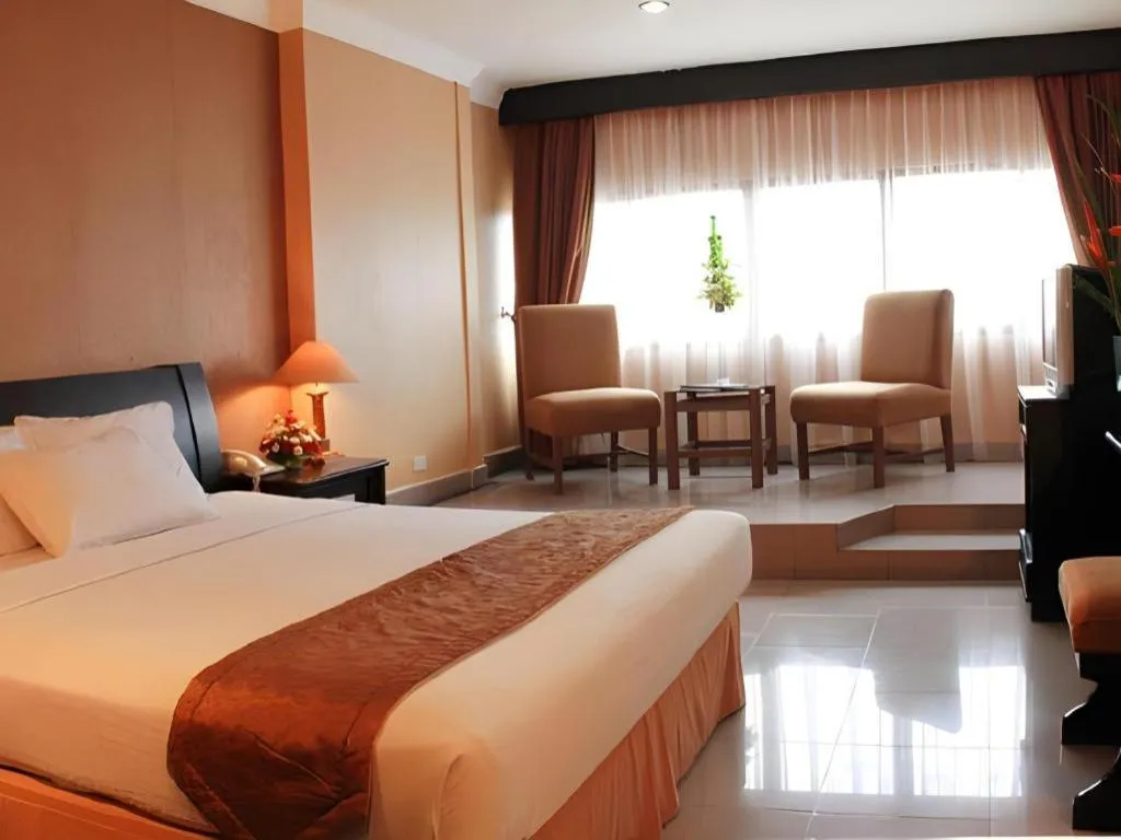 Bed in Danau Toba Hotel International