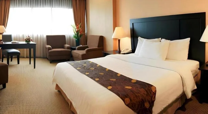 Bed in Danau Toba Hotel International