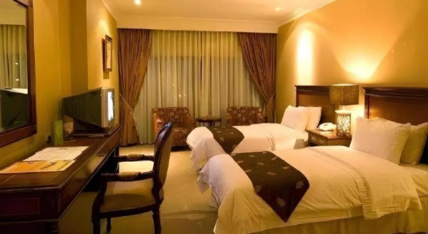 Bed in Danau Toba Hotel International