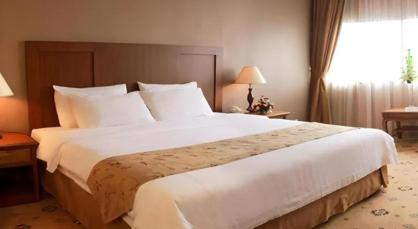 Bed in Danau Toba Hotel International