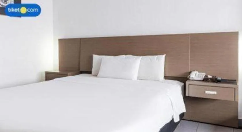 Bed in Danau Toba Hotel International