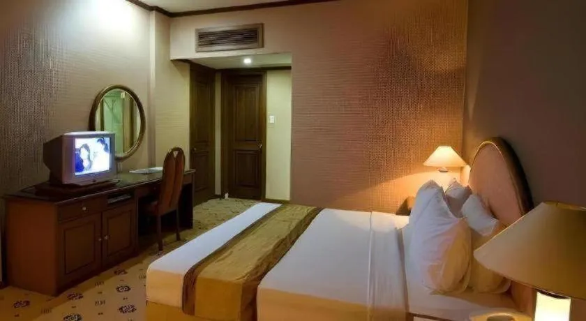 Bed in Danau Toba Hotel International