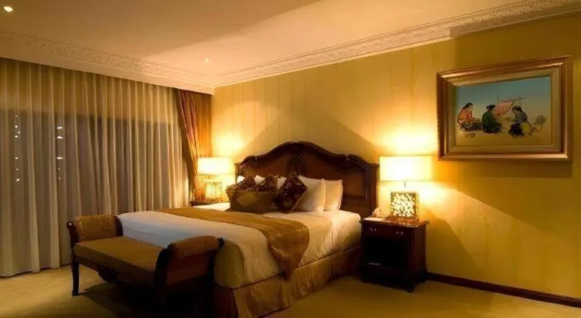 Bed in Danau Toba Hotel International