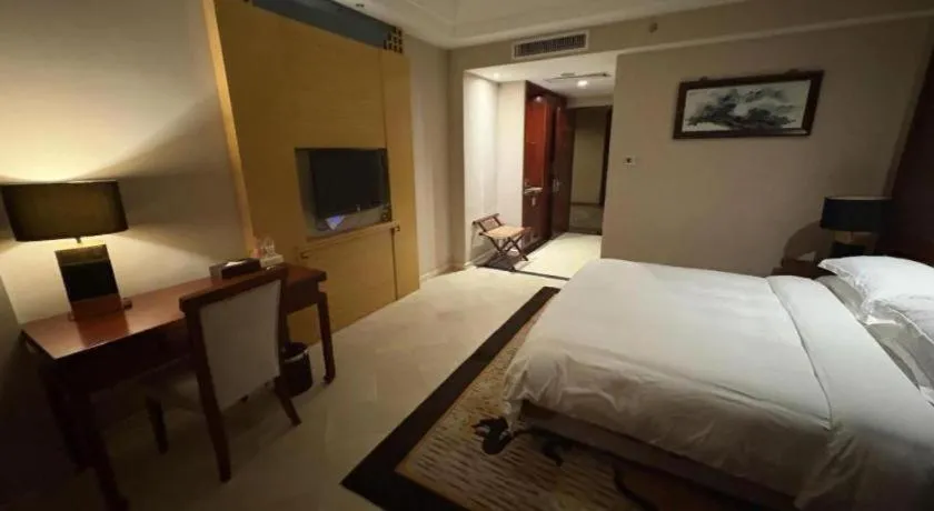 Bed in Jinggangshan ZhongTaiLai International Hotel