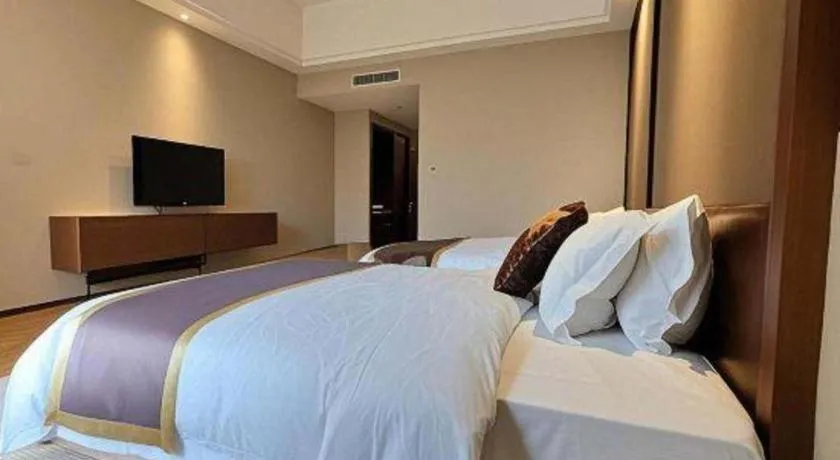 Bed in Jinggangshan ZhongTaiLai International Hotel