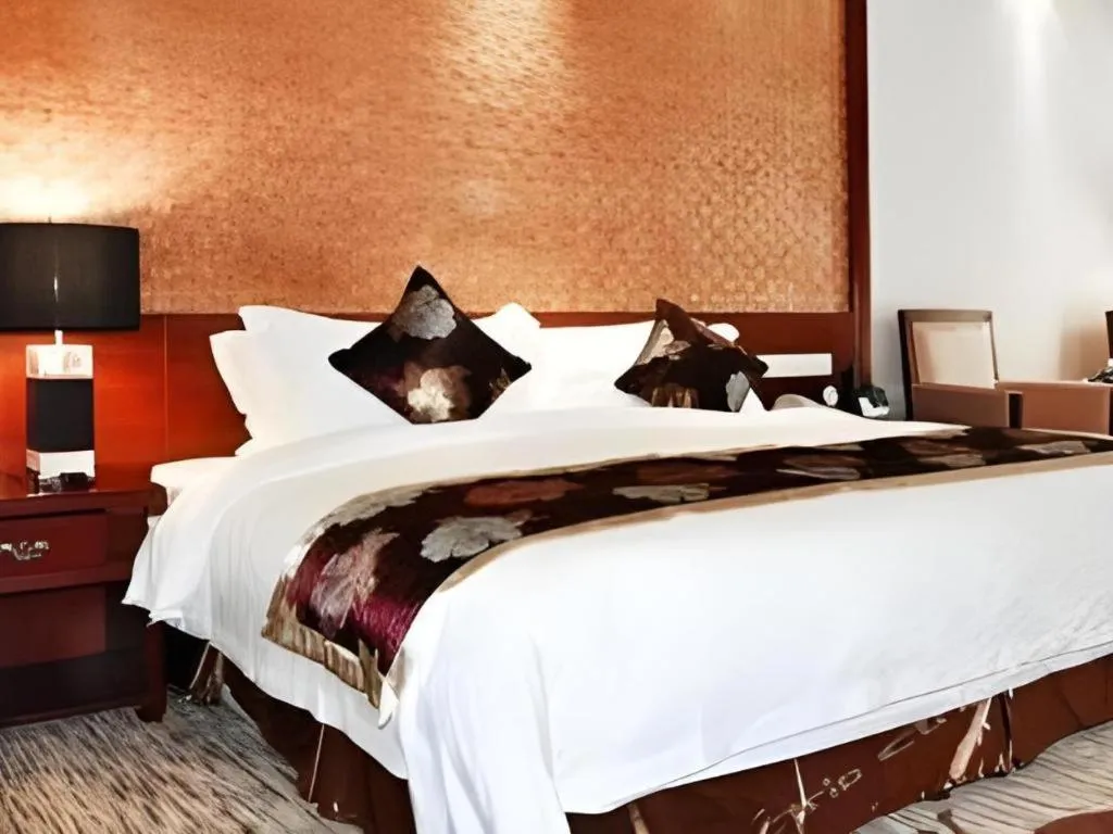 Bed in Jinggangshan ZhongTaiLai International Hotel
