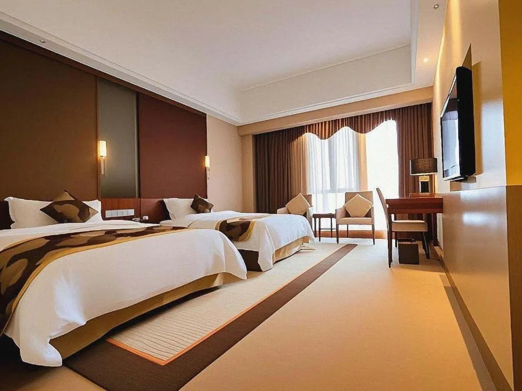 Bed in Jinggangshan ZhongTaiLai International Hotel