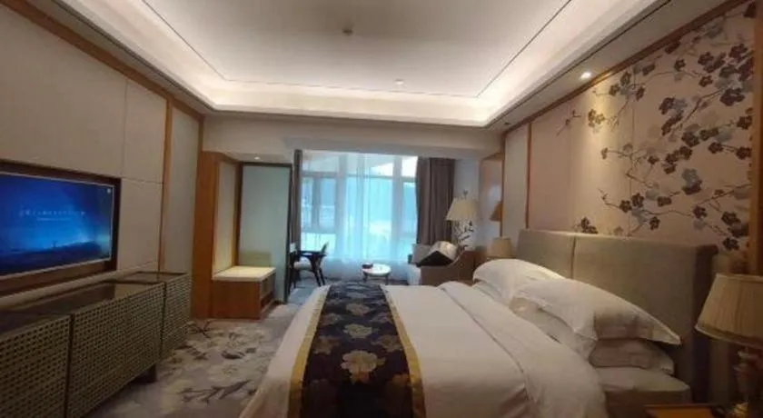 Bed in Jinggangshan ZhongTaiLai International Hotel