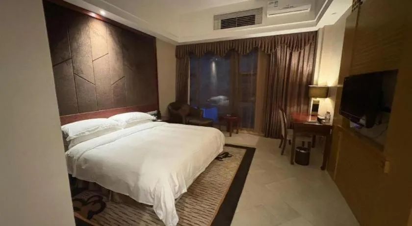 Bed in Jinggangshan ZhongTaiLai International Hotel