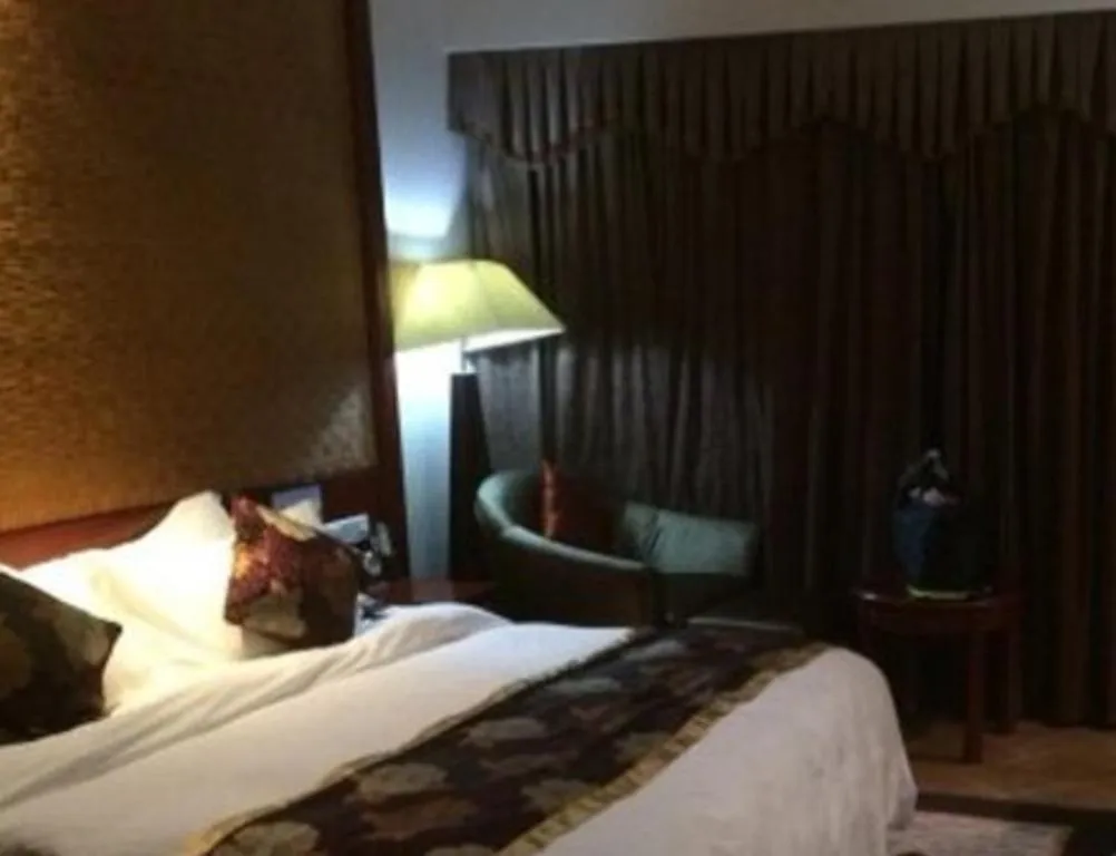 Bed in Jinggangshan ZhongTaiLai International Hotel