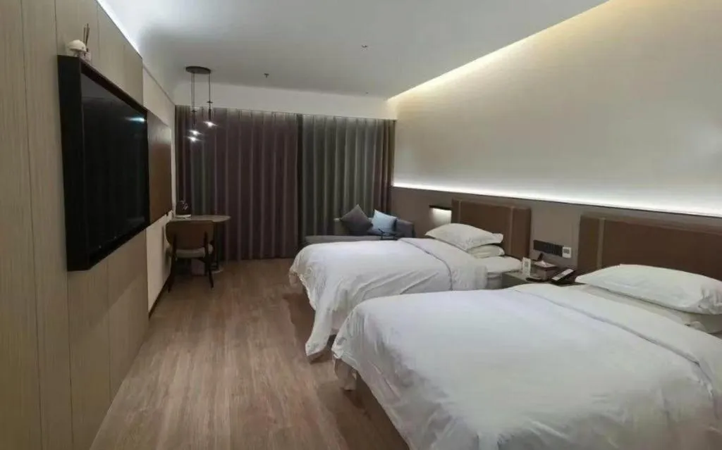 Bed in Jinggangshan ZhongTaiLai International Hotel