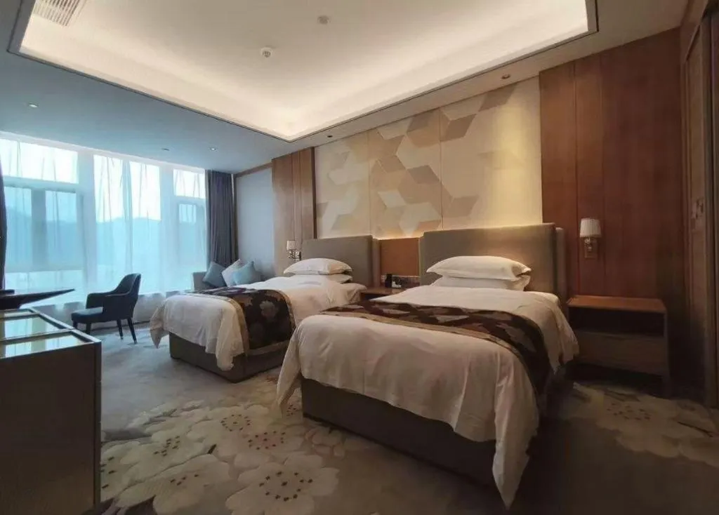 Bed in Jinggangshan ZhongTaiLai International Hotel