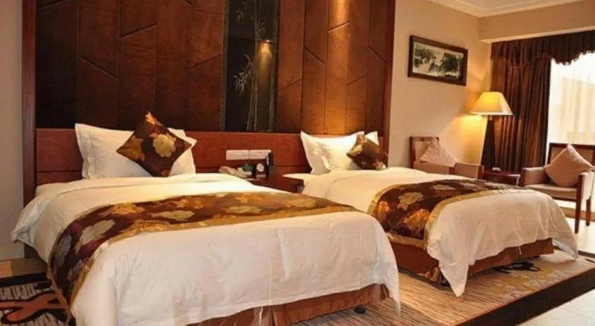 Bed in Jinggangshan ZhongTaiLai International Hotel