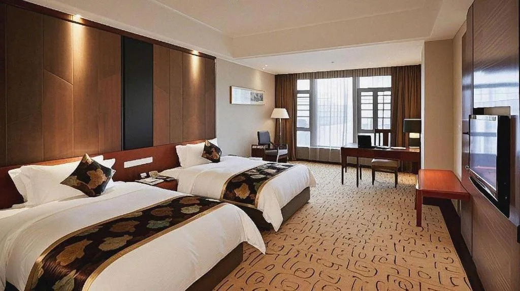 Bed in Jinggangshan ZhongTaiLai International Hotel