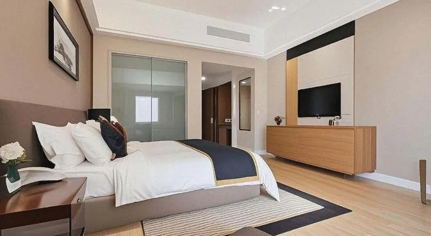 Bed in Jinggangshan ZhongTaiLai International Hotel