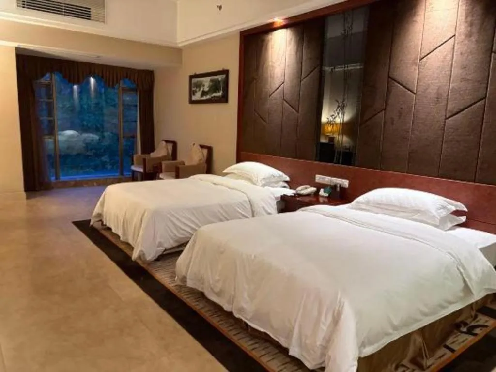 Bed in Jinggangshan ZhongTaiLai International Hotel