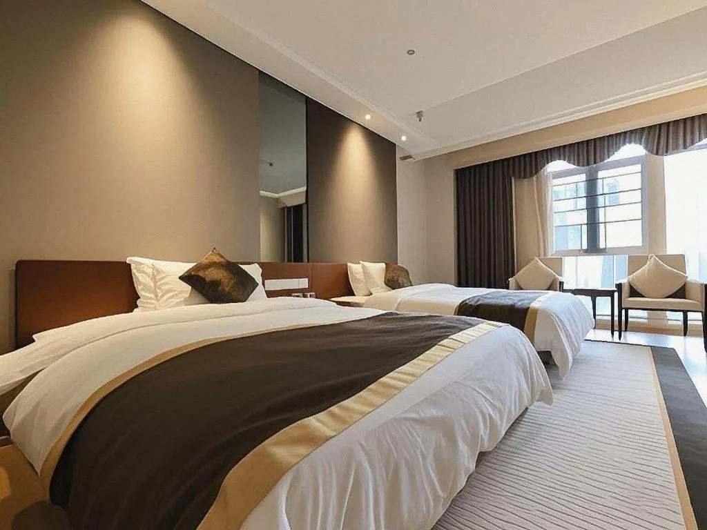 Bed in Jinggangshan ZhongTaiLai International Hotel