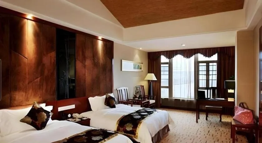 Bed in Jinggangshan ZhongTaiLai International Hotel