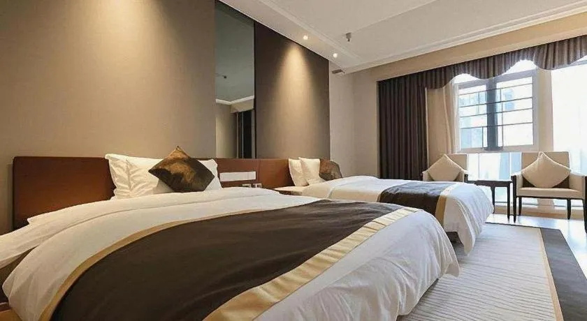 Bed in Jinggangshan ZhongTaiLai International Hotel