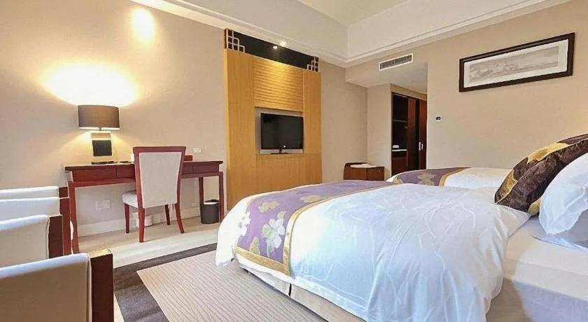Bed in Jinggangshan ZhongTaiLai International Hotel