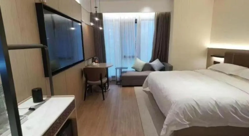 Bed in Jinggangshan ZhongTaiLai International Hotel