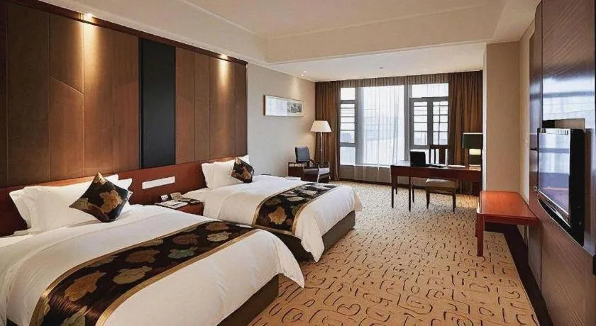 Bed in Jinggangshan ZhongTaiLai International Hotel