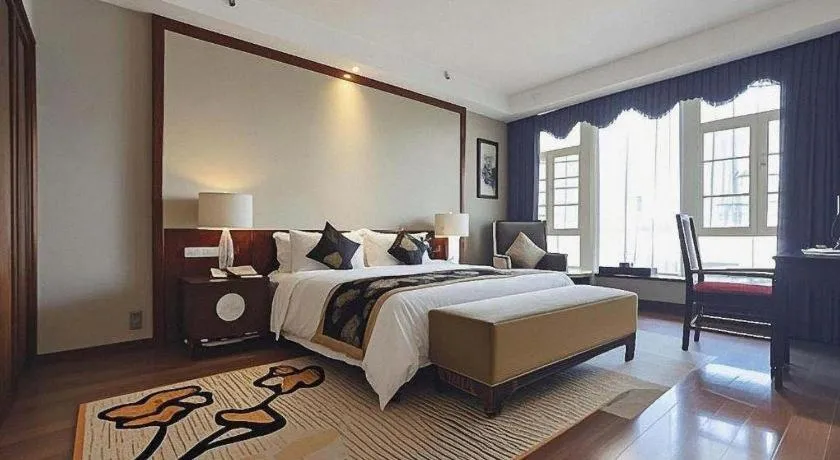 Bed in Jinggangshan ZhongTaiLai International Hotel