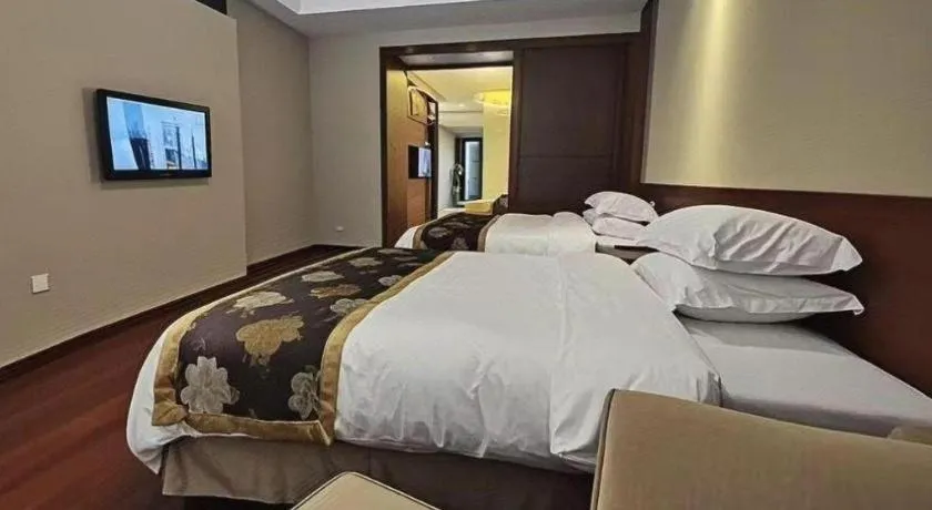 Bed in Jinggangshan ZhongTaiLai International Hotel