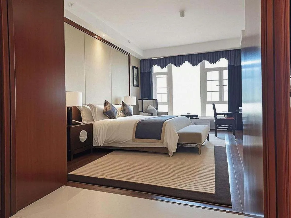 Bed in Jinggangshan ZhongTaiLai International Hotel