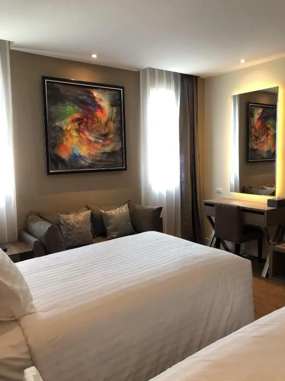 Bed in Sri U-Thong Grand Hotel