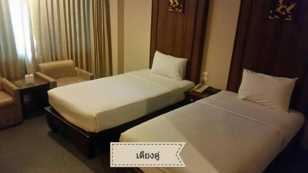 Bed in Sri U-Thong Grand Hotel