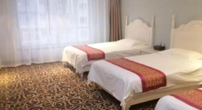 Bed in Longda Ruiji Business Hotel Harbin